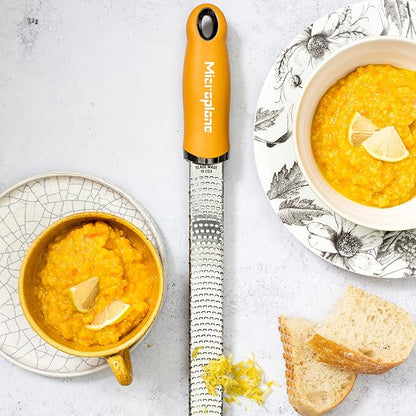 Microplane Premium Zester Grater in Mustard | Lemon Zester tool, Hard Cheese & Vegetable Grater | For Citrus, Parmesan Cheese, Garlic, Ginger, Nutmeg | Fine Stainless Steel Blade, Made in USA